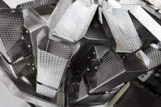 Multihead	weigher with vibratory feeding